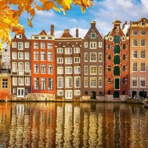 Fotobehang - Houses in Amsterdam 375x250cm - Vliesbehang