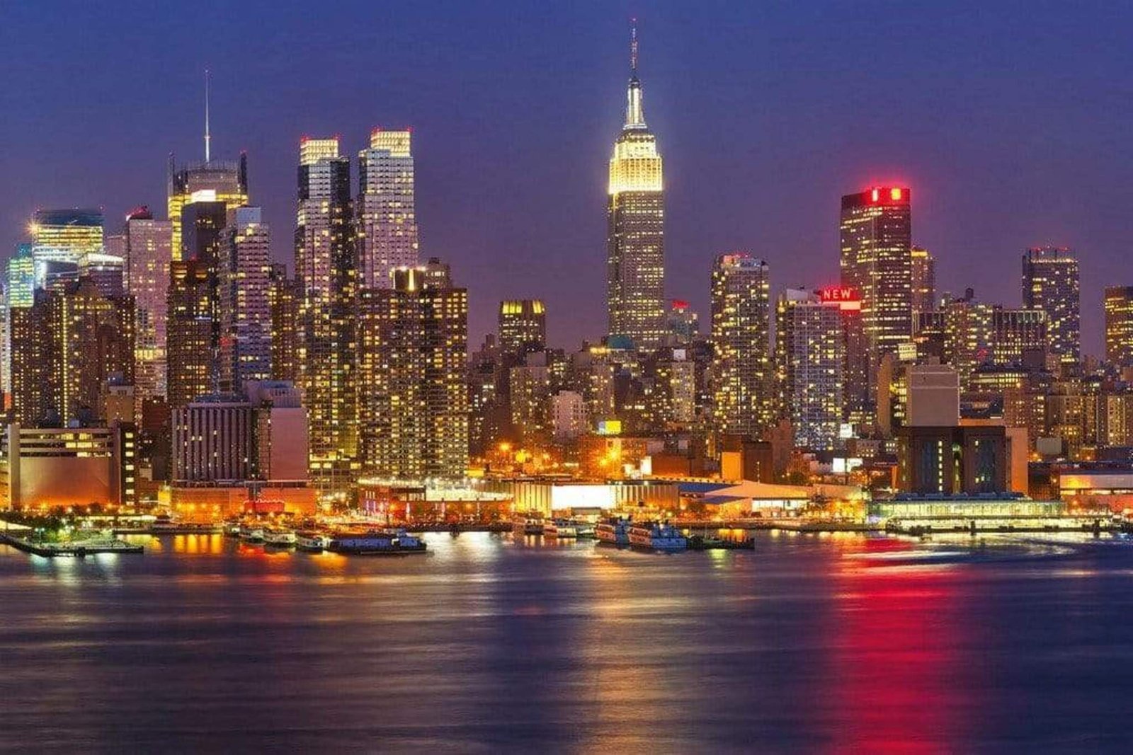 Fotobehang - Manhattan at Night 375x250cm - Vliesbehang 1 Fotobehang - Manhattan at Night 375x250cm - Vliesbehang
